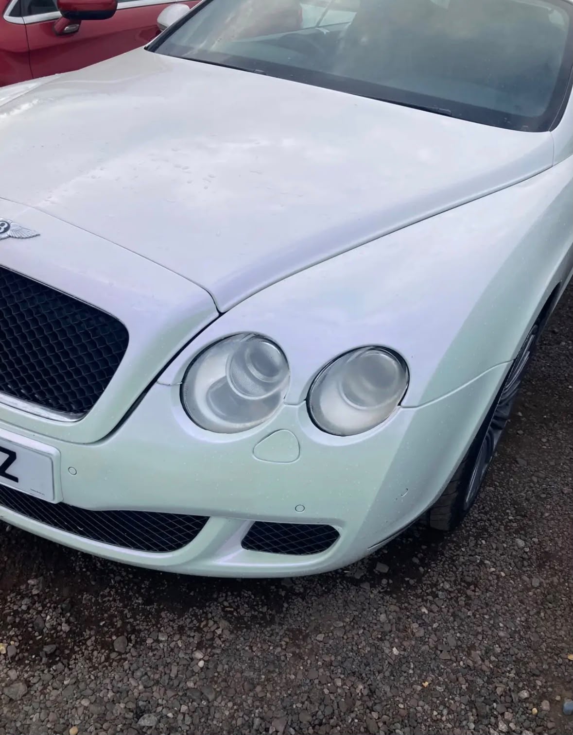 White Bentley Continental after a hand wash